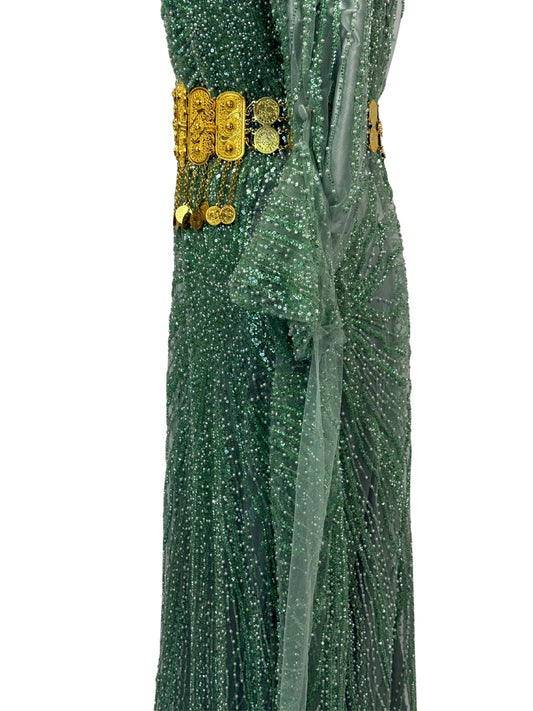 Detail van Jilenpiroz Sewz: glinsterende afwerking en gouden munt-riem